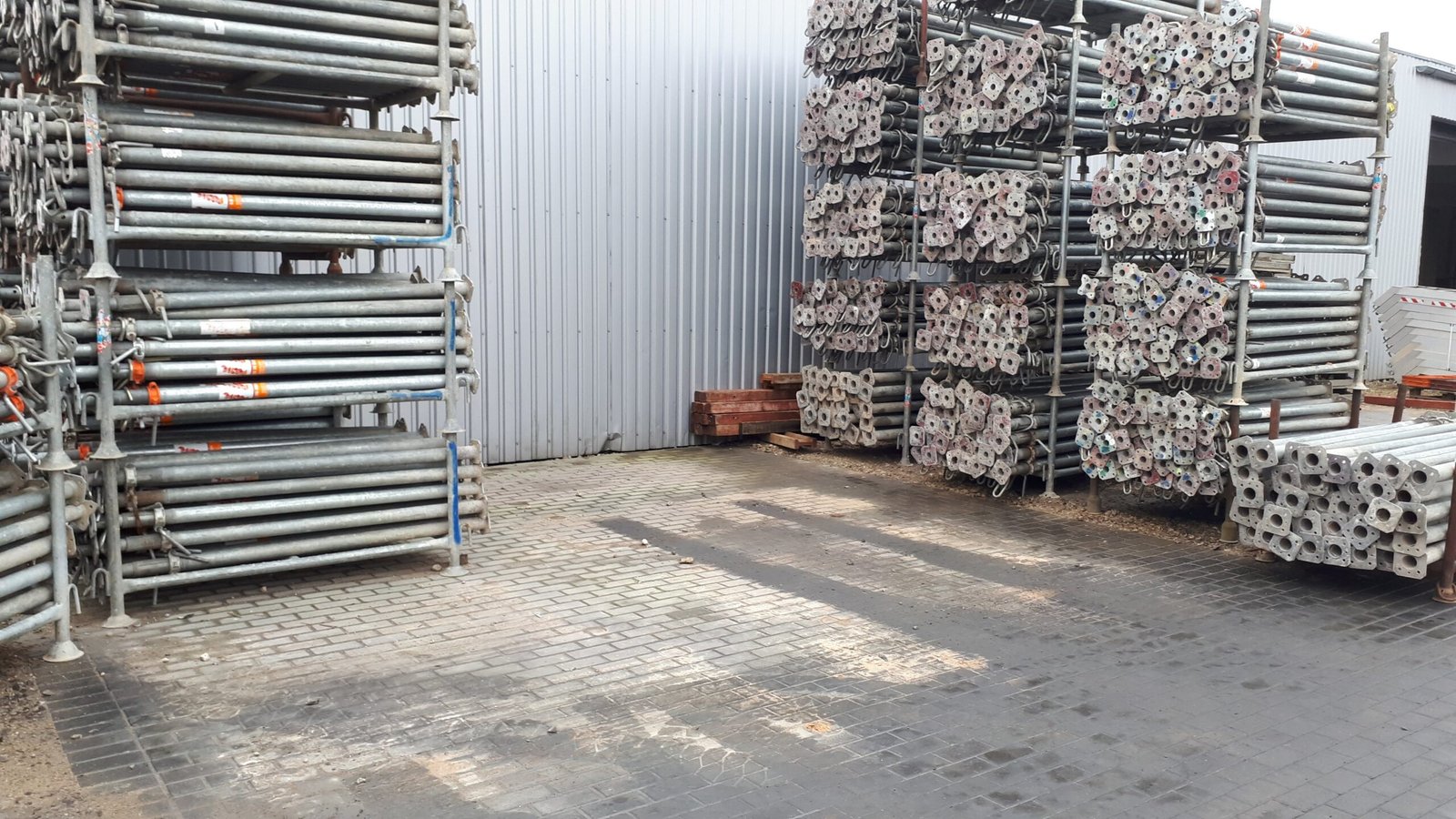 Damaged formwork props stored in a rental yard