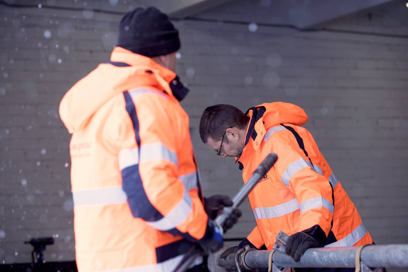 Workers carrying out formwork prop refurbishment